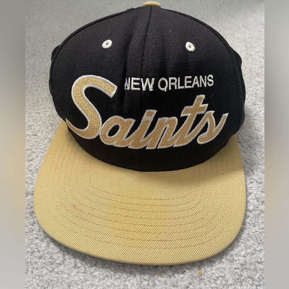 New Orleans Saints cap- faded name on caps brim.